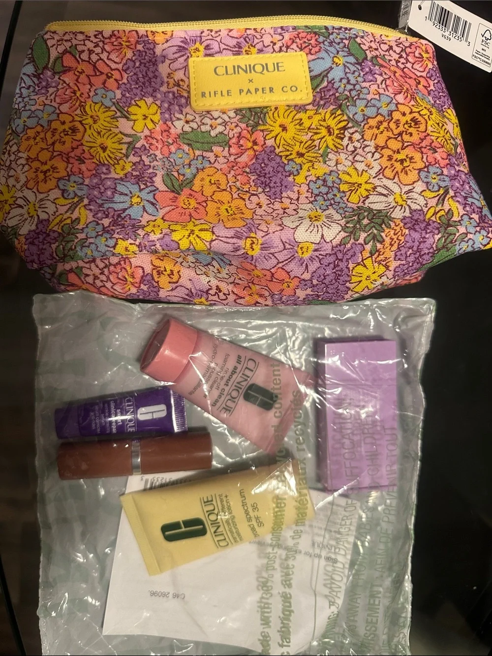 Clinique Floral Makeup Bag with Pink & Purple Travel-Sized Skincare